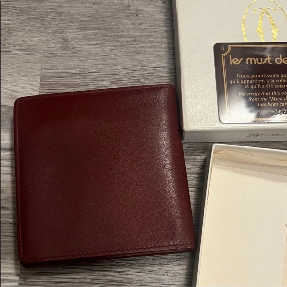 Cartier Burgundy Leather Wallet with Gold Accents